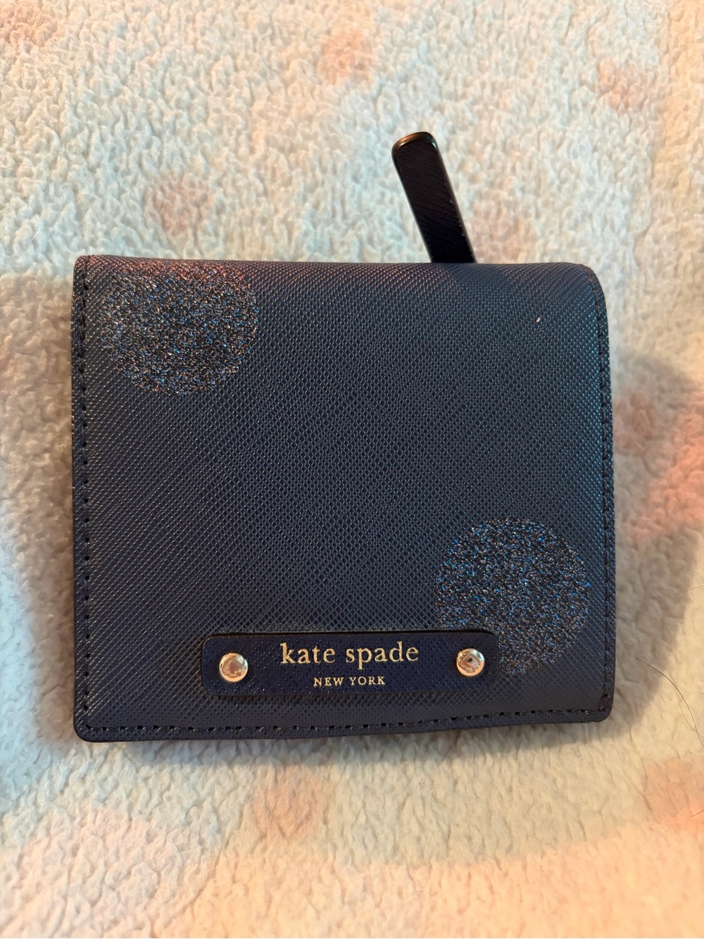 kate spade navy glitter dot bifold wallet